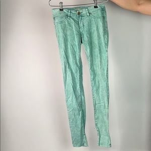 Mint colored “Life in Progress” jeans